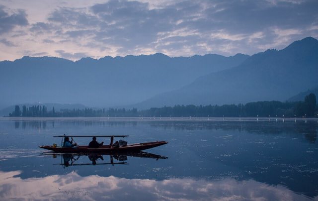 Shikara on Dal Lake at dawn